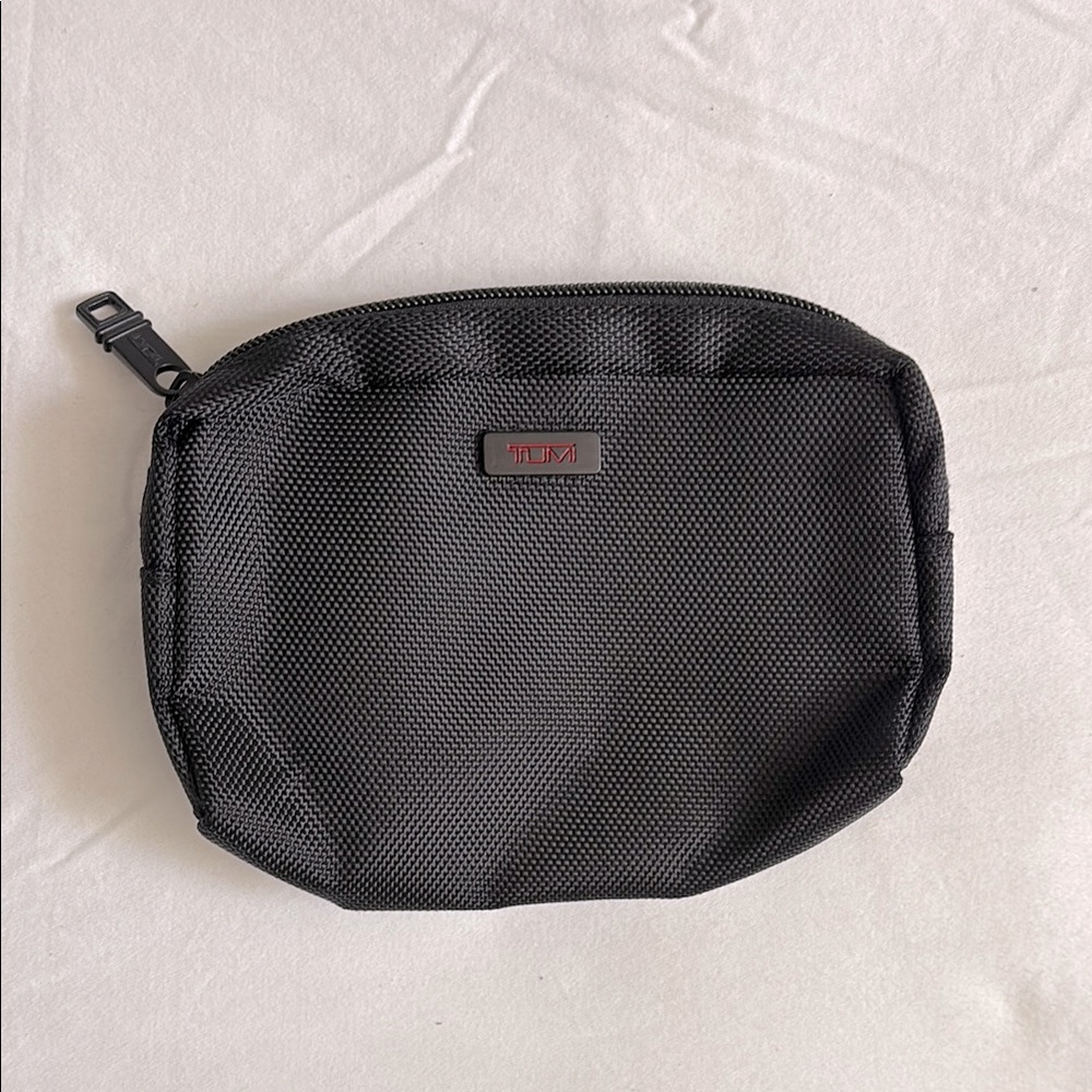 New without tags Tumi nylon small zip pouch